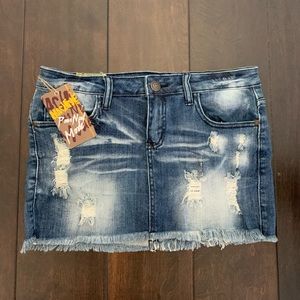 Distressed denim mini skirt